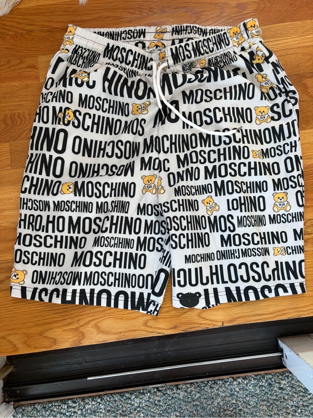 Moschino White Shorts with Black Logo and Yellow Teddy Accents